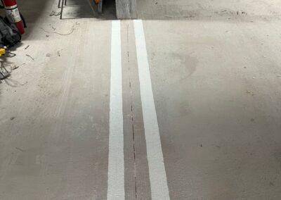 White Parking Lot Line Painting Tricar 2